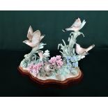 Lladro figurine Bird Group, in original box including base - Four brown birds resting amongst