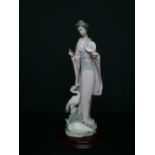 Lladro figurine 6572 "In Touch With Nature" in original box. H42cm, including base.