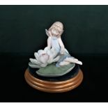 Lladro figurine 6645 "Lily Pad Love" H13cm, including base. (A/F)