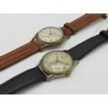 Bakobe hand wound wrist watch. Gold plated case on leather strap. 15 jewel unadjusted movement,