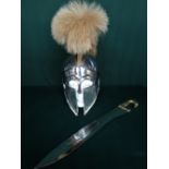 Polished steel Spartan style helmet with plume and a Spartan style sword with steel blade and