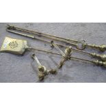 Set of three brass fire irons with ball turned handles L78cm and set of implements rests with urn