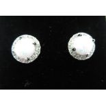 Pair of opal and cubic zircona stud earrings, boxed