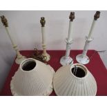Pair of Edwardian ceramic dressing table candlesticks decorated with roses, converted to