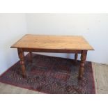 Victorian style pine dining table, moulded rectangular top on turned supports L140cm W85cm H75cm