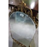 Arched bevel edged mirror in gilt frame