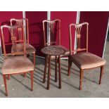 Set of four Edwardian inlaid mahogany dining chairs and an Edwardian centre table with circular top,