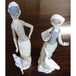 Two Lladro figure of standing goose girls, H27cm (2)