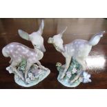 Two Lladro figures of fawns on flower encrusted bases H15cm (2)