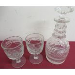 Georgian crystal decanter with triple ringed faceted neck and hobnail band H26cm and a pair of