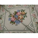 20th C woolwork rug, light green ground with rose pattern centre and scrolling floral pattern border