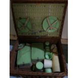 Brexton green plastic and metal picnic set in wicker case, vintage leather suitcase and a vintage