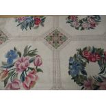 20th C woolwork rug, beige ground with geometric and floral pattern centre, grey border 300cm x