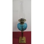 Early 20th C brass oil lamp, turquoise blue glass bowl on corinthian column, stepped square base (