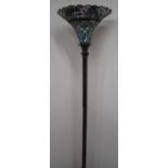 Patinated metal standard lamp with twist turned column and Tiffany style uplighter shade H184cm