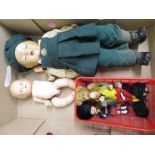 Composition doll with opening eyes and jointed limbs, in green school uniform (H48cm), another