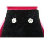 Pair of 14ct white gold diamond stud earrings, approx 60 points, boxed