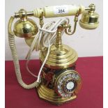 Brass dial style telephone, cylindrical body cast with horses on octagonal stepped base, H31cm