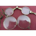 Victorian rolled gold lorgnette and two rolled gold monocles (3)