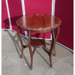 Late Victorian walnut centre table with pie crust edge on six cabriole legs with circular raised