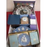 Wedgwood wall clock, a Cleo pattern quartz mantle clock, collection of Wedgwood blue jasperware