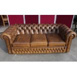 Three seater chesterfield settee in chestnut brown leather with deep button back 190cm 90cm 69cm