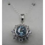 Silver, cubic zircona and blue topaz pendant on chain, stamped 925, boxed