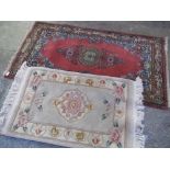 Small Chinese rectangular hearth rug decorated with flowers on a neutral ground 100 x 61cm: a