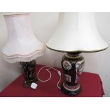 Oriental style table lamp, baluster body decorated with a dragon chasing pearl on turned wooden base