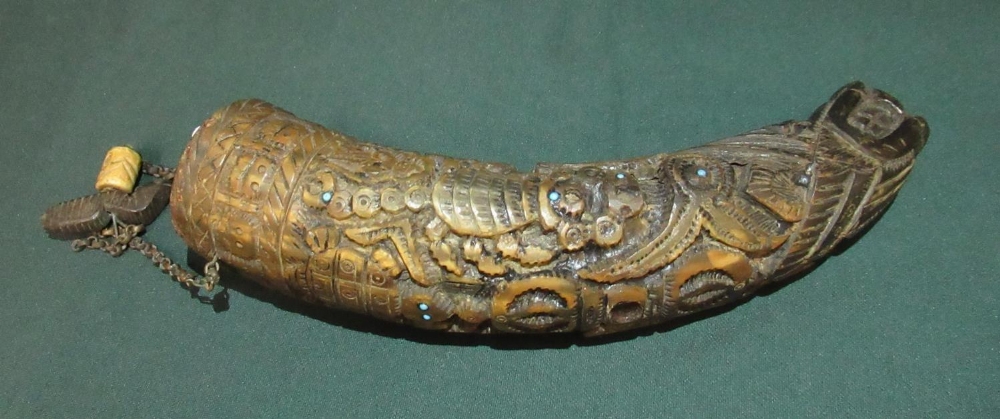 18th/19th C Tibetan powder horn carved in the shape of a mythical creature with other decorations