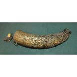 18th/19th C Tibetan powder horn carved in the shape of a mythical creature with other decorations