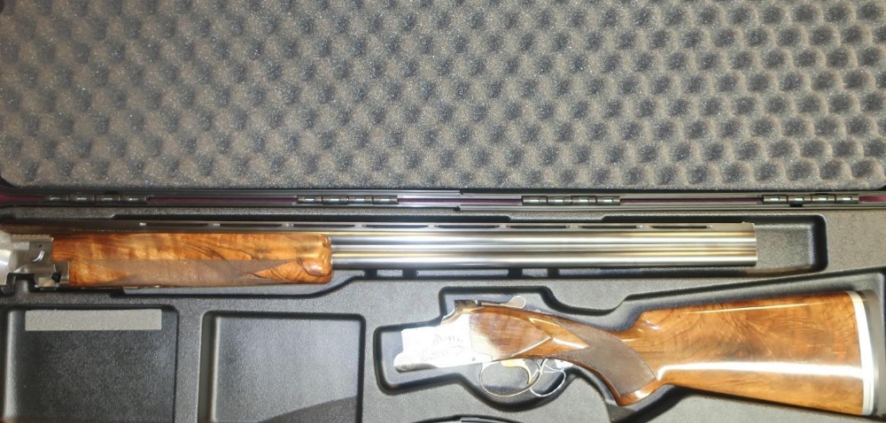 Cased Browning B25 Model B2G Trap 12 bore over & under ejector shotgun with 29 3/4 inch barrels,