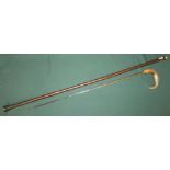 Early 20th C walking sword cane with bamboo stick and carved horn handle, 22.5 inch tapering blade