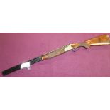 Lanber 12 over & under ejector shotgun with 2 3/4 inch chambers, 29 1/2 inch multi-choke barrels,