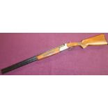 Italian 12 bore over & under ejector shotgun with 27 1/2 inch barrels, choke 3/4 & 1/2, single