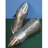 Pair of Italian articulated steel gauntlets with leather backing to the fingers