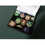 Collection of ten military lapel badges including RAF wings, SAS etc