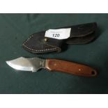 Skinning knife with macater handle