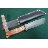 Military style sheath knife with blackened 6.5 inch blade marked 4240-99-127-8214 J Adams 1999, with