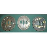 Set of three bronze tsuba depicting Samurai warriors, tiger, hanging lanterns from a tree