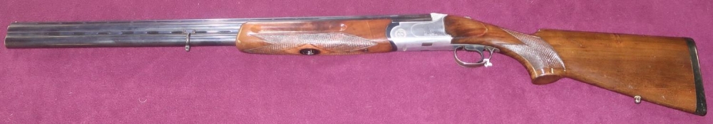 Castellini 12 bore over and under single trigger ejector shogun with 27.5" barrels, choke full &