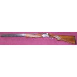 Castellini 12 bore over and under single trigger ejector shogun with 27.5" barrels, choke full &