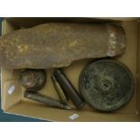 Box containing three shell casings motor bomb head, trench art, and fragment of bomb case