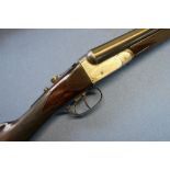 Unnamed 12 bore side by side shotgun with 28 inch barrels and 15 1/4 inch straight through stock,