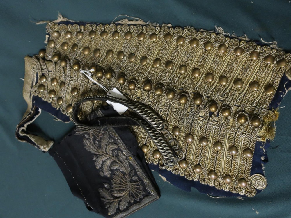 Early 20th C brocade artillery dress front, and a embroidered with white metal wire cuff from