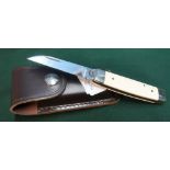Sheffield made single bladed pocket knife with ivory grips and working back detail, with leather