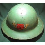 c.WWII British steel helmet with liner, webbing and chinstrap, with painted decal