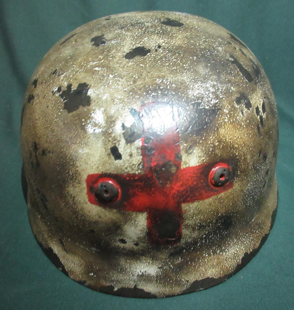 German para medic steel helmet, the inside with painted detail K. Steiner with modern liner and chin