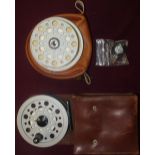 Anglers Services Ltd case and alloy spool, a leather cased Beaulite Shakespeare reel and a Hardy pin