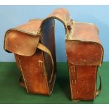 Pair of German c.WWI leather saddle bags, with various stamped numbers